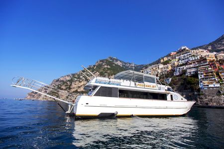 How far is positano from capri by boat