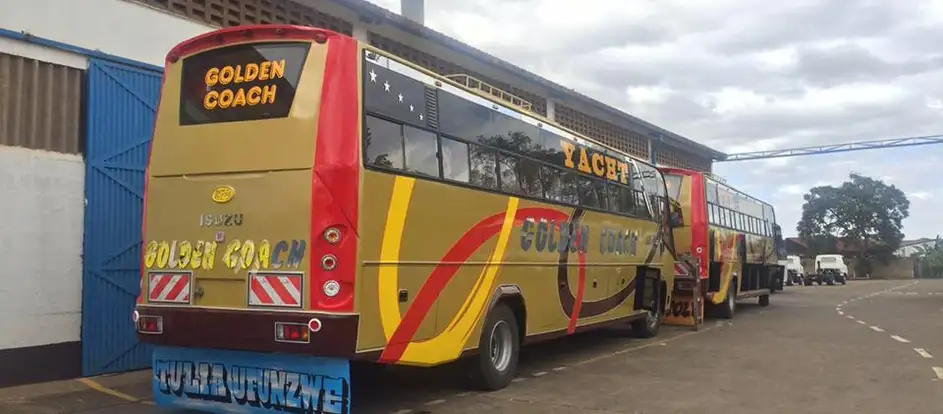 Golden Coach bringing passengers to their travel destination